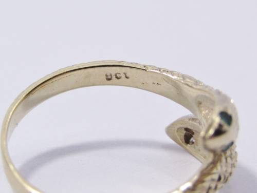 Antique design 9 carat gold ring with a double snake head