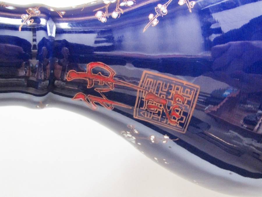 Two Gorgeous Chinese Dark Blue Chinese Porcelain Vases With White Blossoms