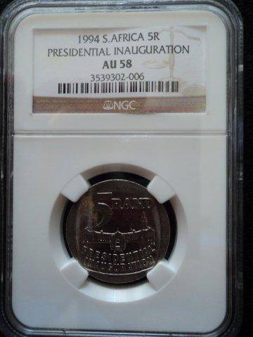 1994 Presidential Inauguration R5 .  AU58 NGC Graded Coin. Building in front.