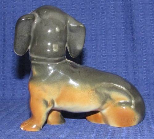 TWO VINTAGE GERMAN DACHSHUND FIGURINES - One Gerold Bavaria