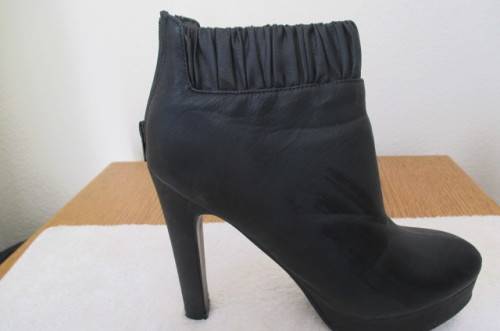 **Stunning pair of black very high heel ankle boots**