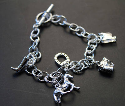 STUNNING STERLING SILVER CHARM BRACELET