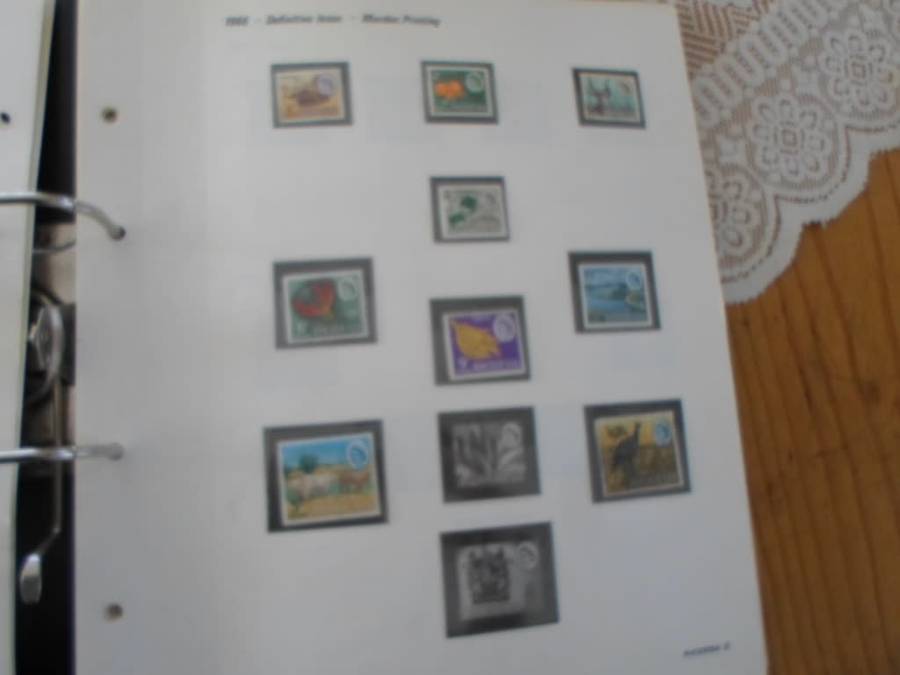 FILE RHODESIA MINT STAMPS ONLY SOME PAGES SCANNED SEE PICS