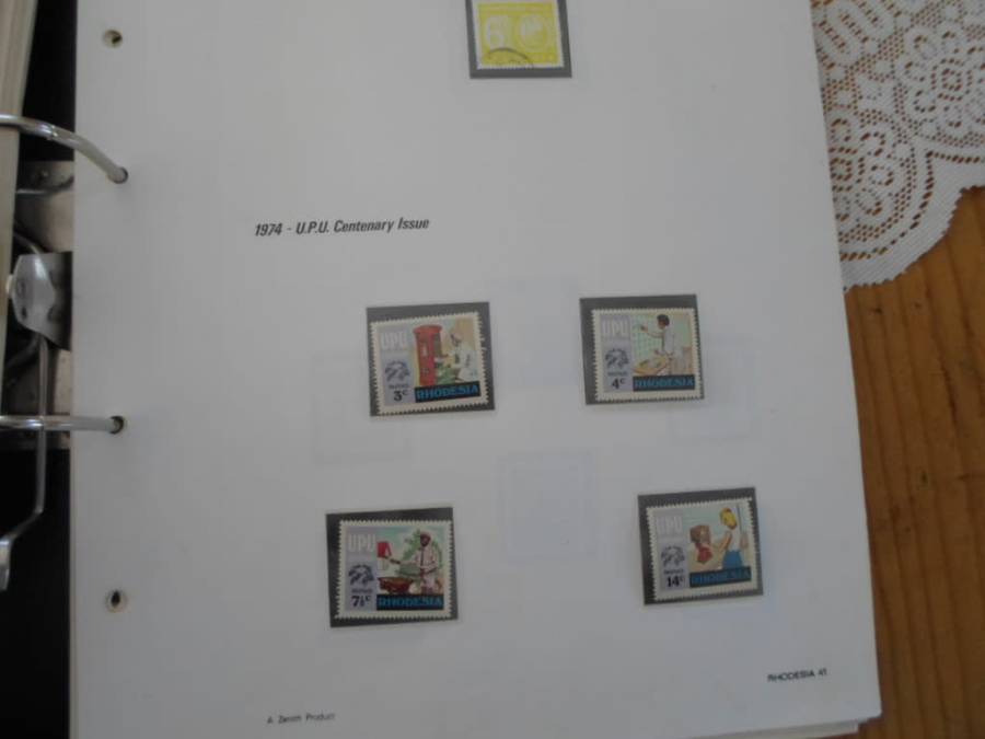 FILE RHODESIA MINT STAMPS ONLY SOME PAGES SCANNED SEE PICS