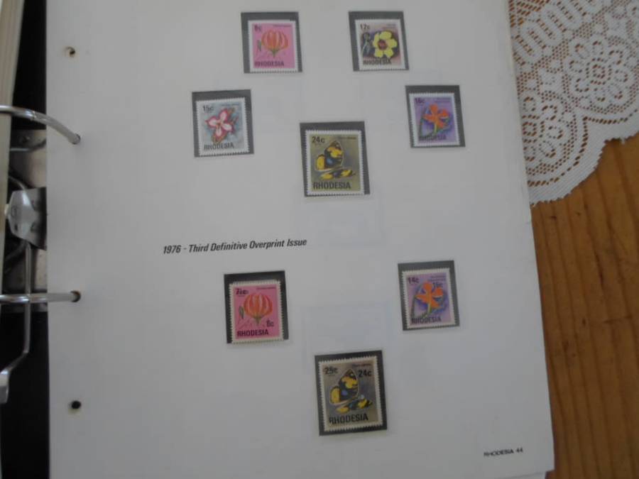 FILE RHODESIA MINT STAMPS ONLY SOME PAGES SCANNED SEE PICS
