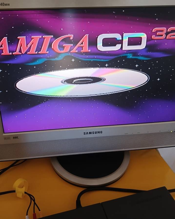 Commodore Amiga CD 32 console with Games