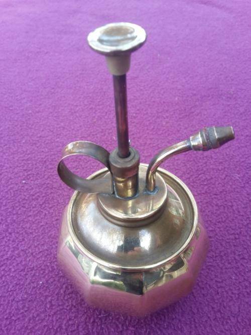 Perfume bottle crafted in brass