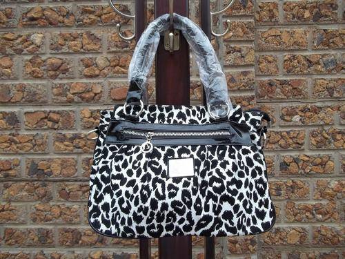 **HOT Designer style ladies hand bag in ANIMAL PRINT. Faux leather and suede. Make Fashion statement