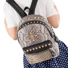 *NEW ARRIVALS*Stunning Ladies Back pack in mock snake skin leather with studs- Excellent quality!.