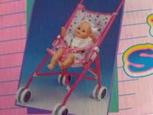 Attractive Doll Stroller -included**Free suprise gift to delight any young lady**