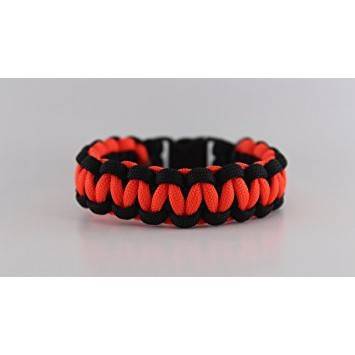Survival bracelet with compass, flint and handy multitool