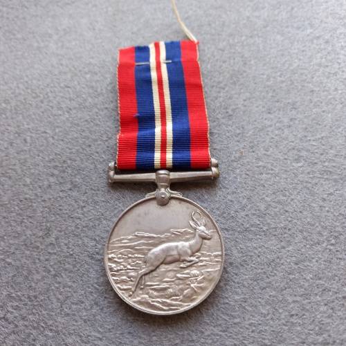 1 X WW2 FULL SIZE AFRICA SERVICE MEDAL AWARDED TO ACF S.F. BUSH.