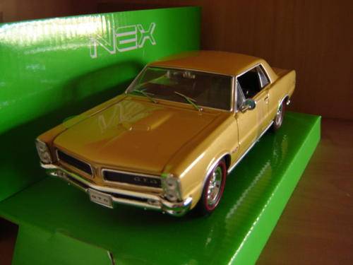 ' 65 Pontiac GTO  Gold Die Cast Model Sc 1/24    WELLY NEX   New in D/ Box. Gteed- In Stock