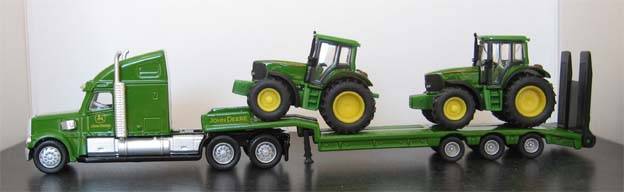 LOW LOADER WITH 2 JOHN DEERE TRACTORS by SIKU in 1/87 HO SCALE.(NEW BOXED)