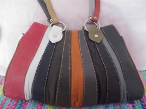 LADIES GENUINE LEATHER HAND BAG IN  A multi color . SIMPLY GORGEOUS!!