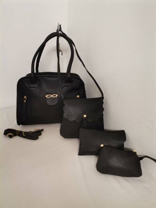 Ladies stunning black 4 pieces handbags