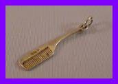 VINTAGE SILVER COMB CHARM