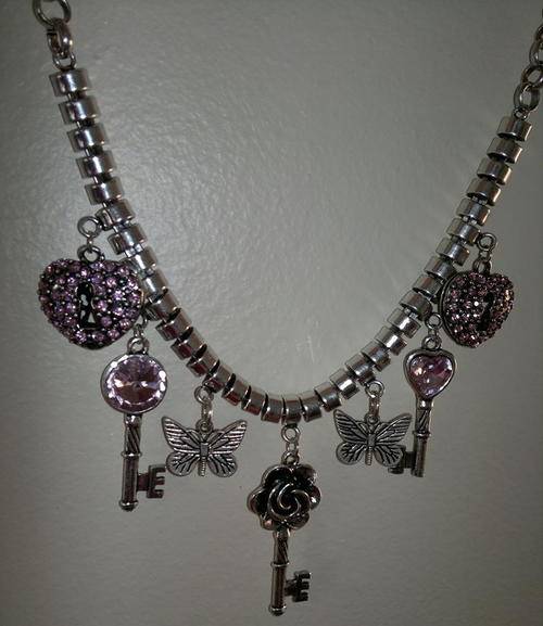 A MUST HAVE - Absolute gorgeous light pink and silver charm necklace