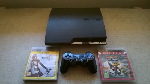 250 gb Ps3 slim with 2 games and 2 controllers