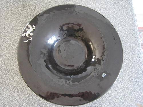 Stunning solid glass bowl with steel effect lizard