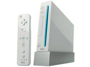 NINTENDO WII CONSOLE with 3 GAMES , plus machine gun and other accessories!!