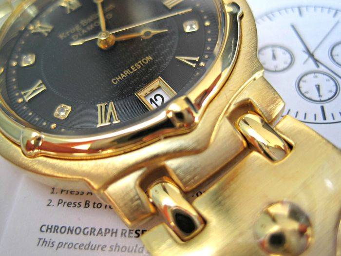 Retail: R10,714.00** Krug-Baumen MEN Charleston 4 Diamond Black Dial Gold Strap Watch