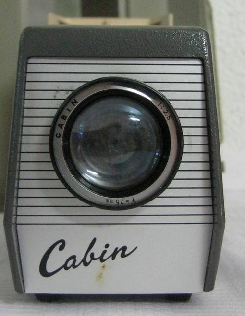 OLD CABIN PROJECTOR IN CASE AND STILL IN ITS ORIGINAL BOX