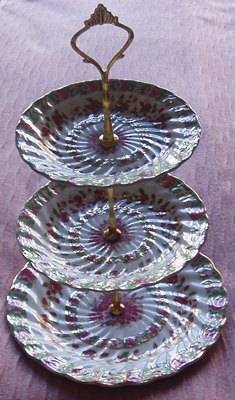A NICE BIG 3 TIER PORCELAIN CAKE PLATE WITH HANDEL