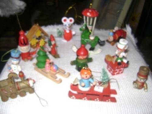 large collection of wooden christmas decorations