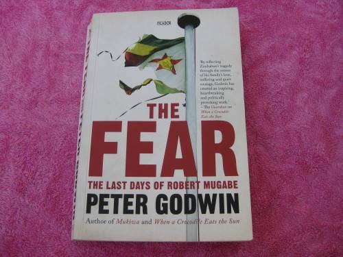 "The Fear Robert Mugabe and the Martyrdom of Zimbabwe"  Soft cover.  Peter Godwin.