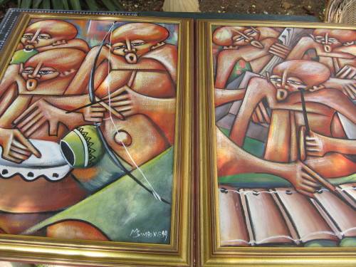 Original framed paintings by M. Simbine dated 1999.  Mozambique.