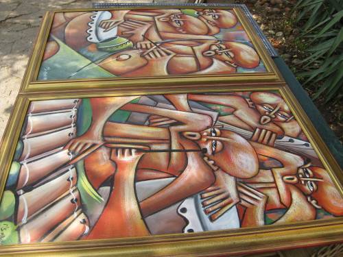 Original framed paintings by M. Simbine dated 1999.  Mozambique.