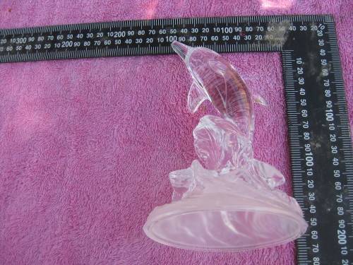 Glass dolphin ornament.