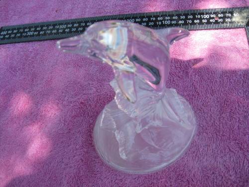 Glass dolphin ornament.