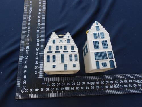 Blue Delft`s exclusively made for KLM by Bols Royal Distilleries Holland.  Houses no`s. 50 and 87.