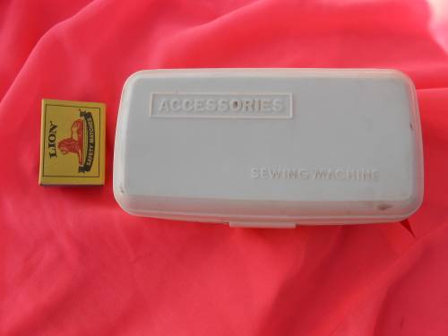 Singer sewing machine accessories.