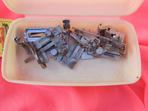 Singer sewing machine accessories.
