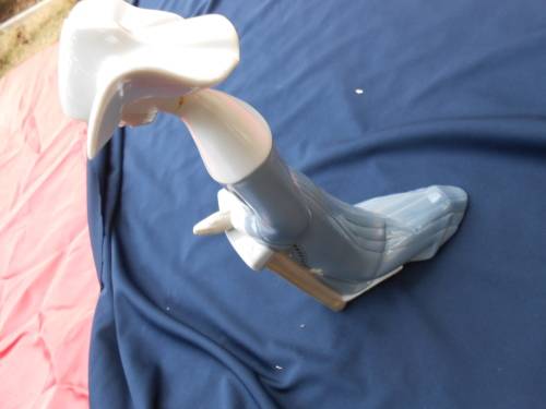 REPAIRED.  As-found.  Lladro with her head glued back on.  Sorry.