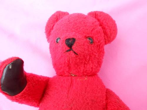 Red `Reindeer` label teddy bear.  Made in South Africa. 400mm high. Hole in right paw and foot.