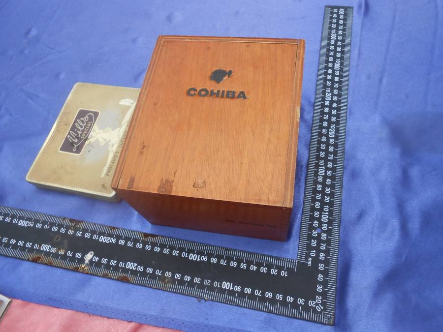 EMPTY cigar box and cigarette tin.