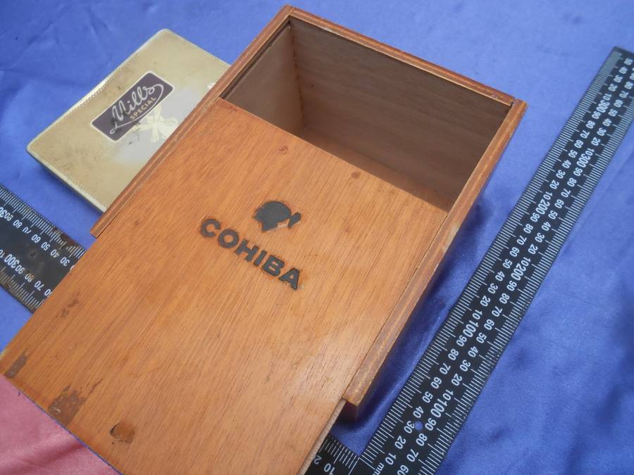 EMPTY cigar box and cigarette tin.