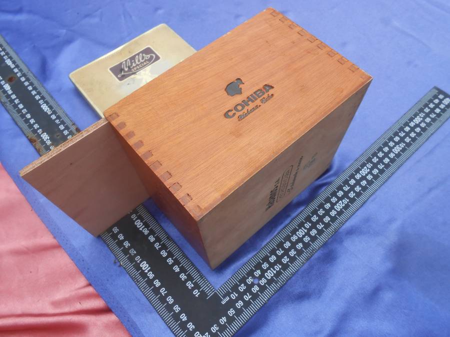 EMPTY cigar box and cigarette tin.