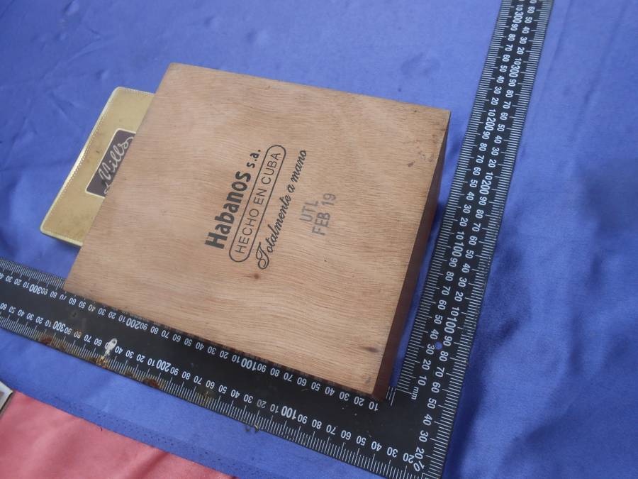 EMPTY cigar box and cigarette tin.
