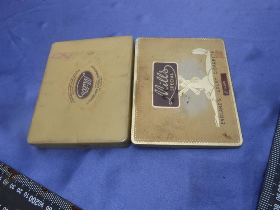 EMPTY cigar box and cigarette tin.