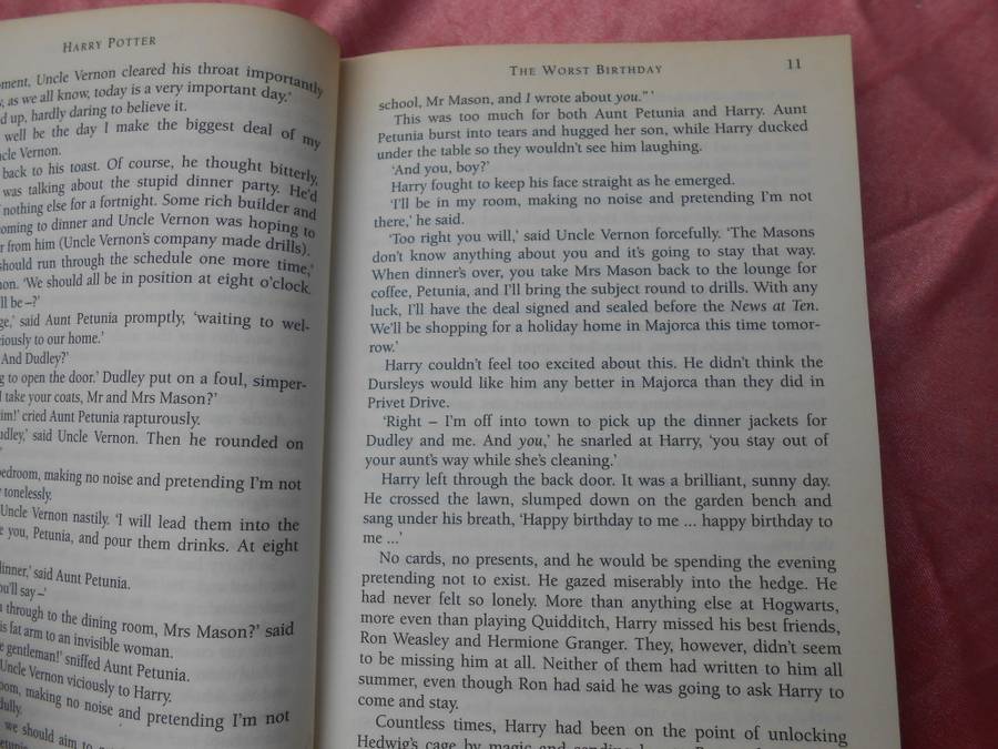 `Harry Potter and the Chamber of Secrets`  J.K. Rowling.  Soft cover.