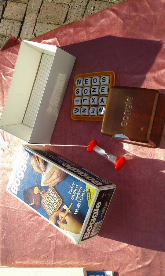 Boggle.  A hidden word game.  2 to 6 players.  Ages 8 to adult.