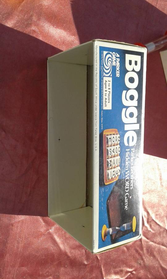 Boggle.  A hidden word game.  2 to 6 players.  Ages 8 to adult.