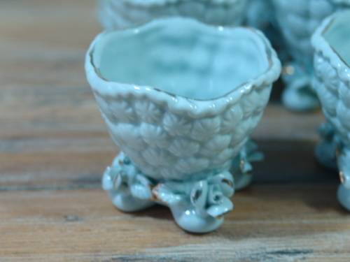A set of 9 Vintage porcelain Egg Cups, blue with gold trim, excellent condition