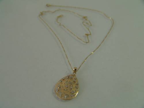 10ct Yellow gold teardrop pendant with 18 natural diamonds on a 9ct yellow gold chain