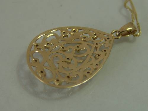 10ct Yellow gold teardrop pendant with 18 natural diamonds on a 9ct yellow gold chain
